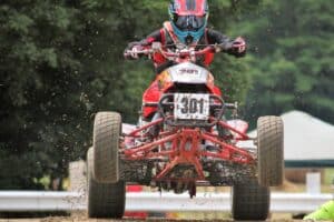 man riding ATV