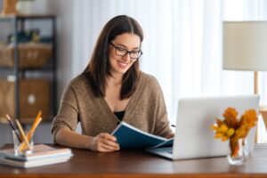 young woman working at home