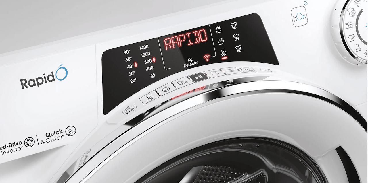 Un lave-linge hublot de la marque Candy.