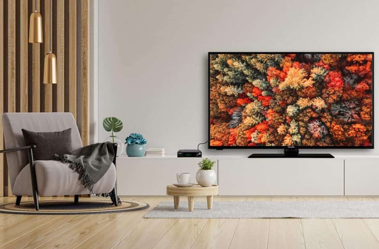 Un téléviseur de la marque Telefunken sur un meuble TV moderne.