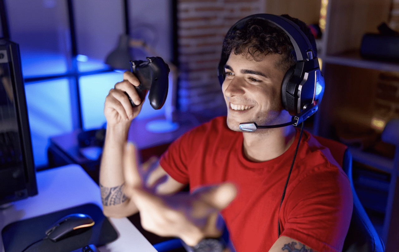 Un streamer qui joue au jeux vidéos chez lui.