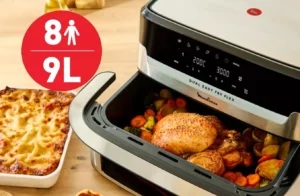 L'aurfryer Mulinex Easy Fry Dual Flex avec son compartiment de cuisson ouvert laissant voir un poulet rôti avec ses légumes