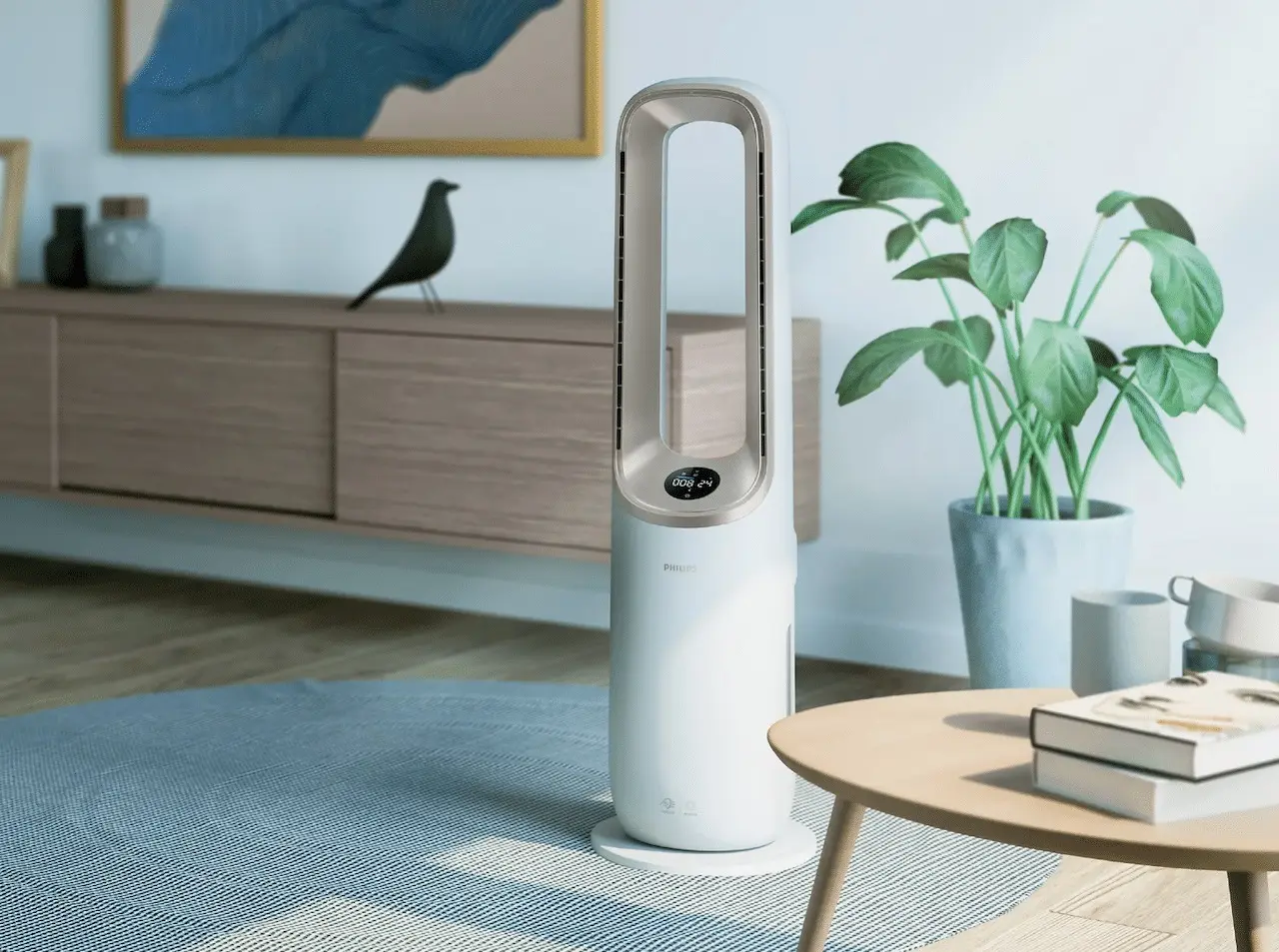 Un purificateur d'air Philips posé sur le sol d'un salon moderne et épuré