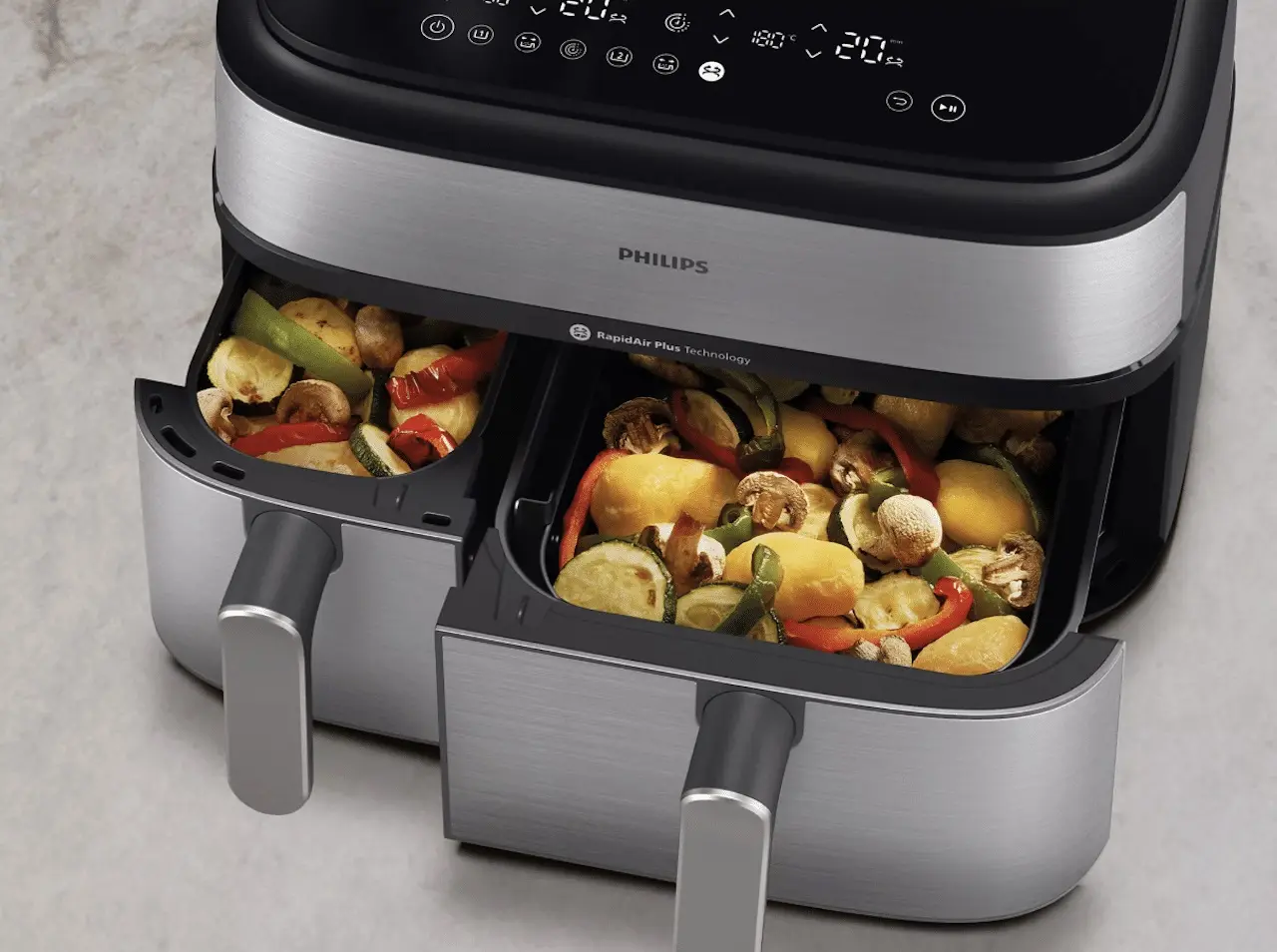 Gros plan sur un Air Fryer avec double compartiment.